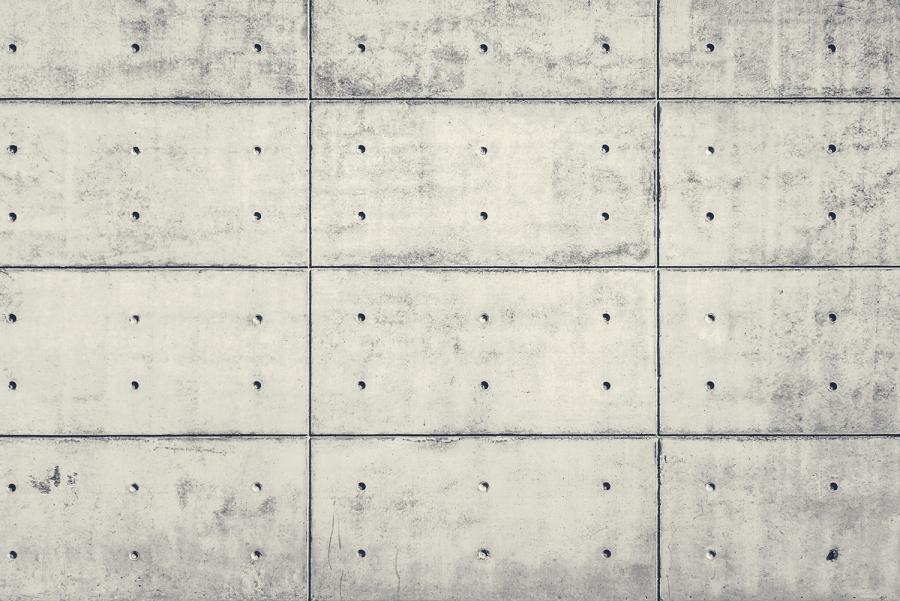 Banner Betonwand mit Löchern in einem gelben Farbton als Textilbanner oder PVC-Banner für Firmenveranstaltungen etc.