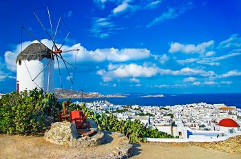 Banner Blick auf Mykonos mit einer Windmühle in Griechenland als Textilbanner oder PVC-Banner