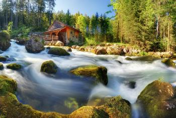 Banner Mühle am Fluss in den Alpen in Österreich als Textilbanner oder PVC-Banner für z.B. Hochzeiten, Schaufenster etc.